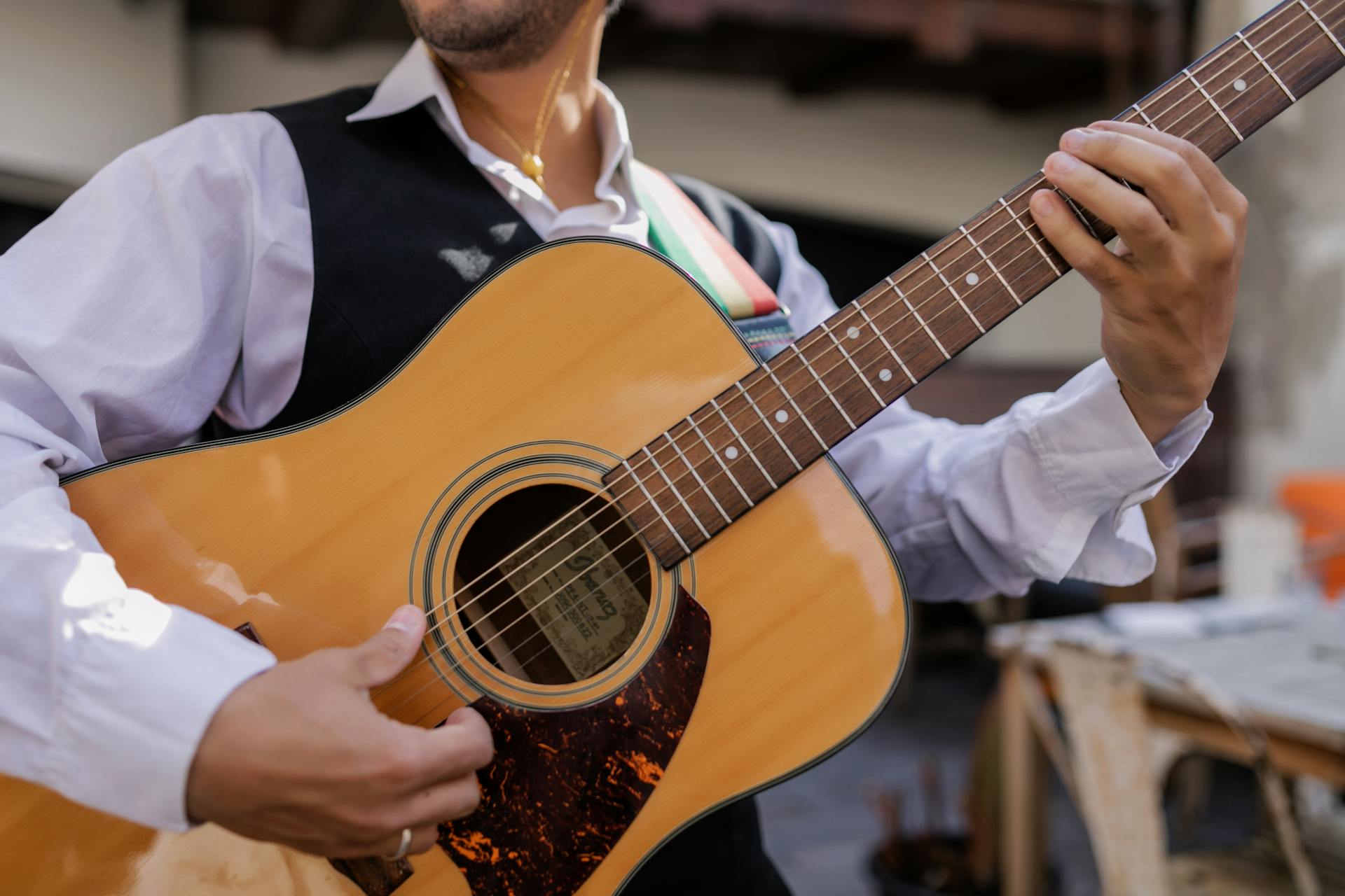A Person Playing the Guitar