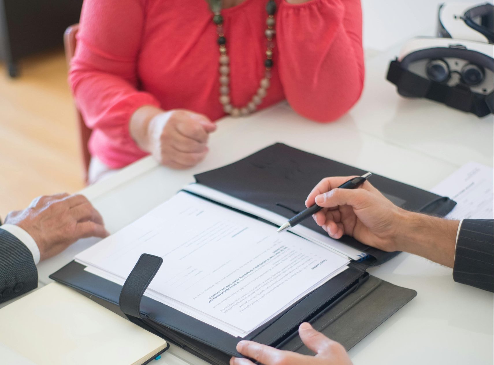 person-discussing-real-estate-agreement-of-home-mortgage-to-senior-couple