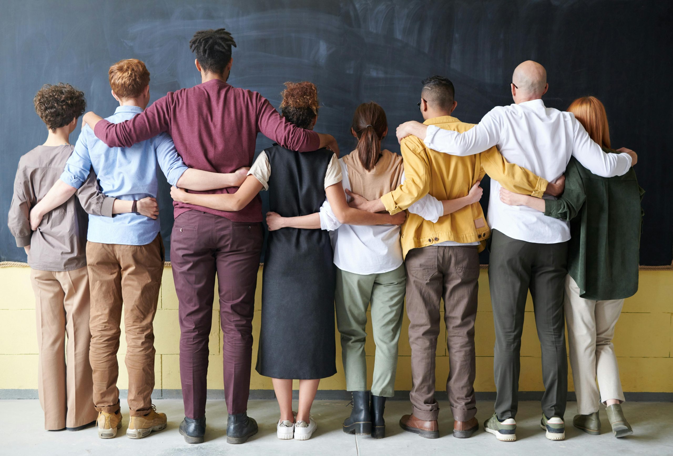group-of-people-standing-indoors